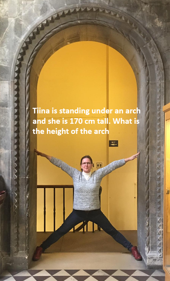 Tiina standing under an arch