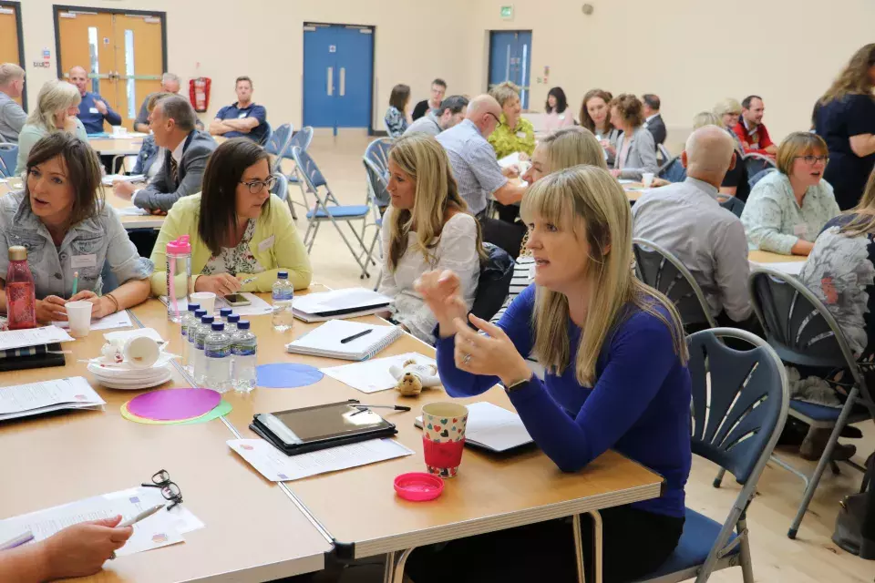 More conference participants at table