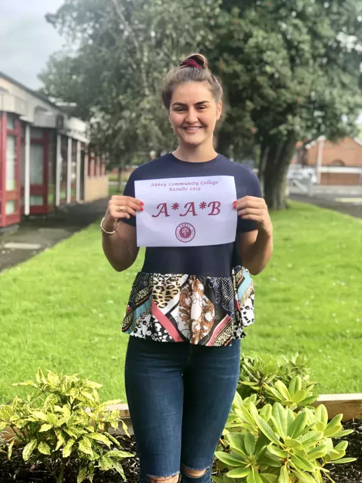 Student from Abbey Community College celebrating A level results