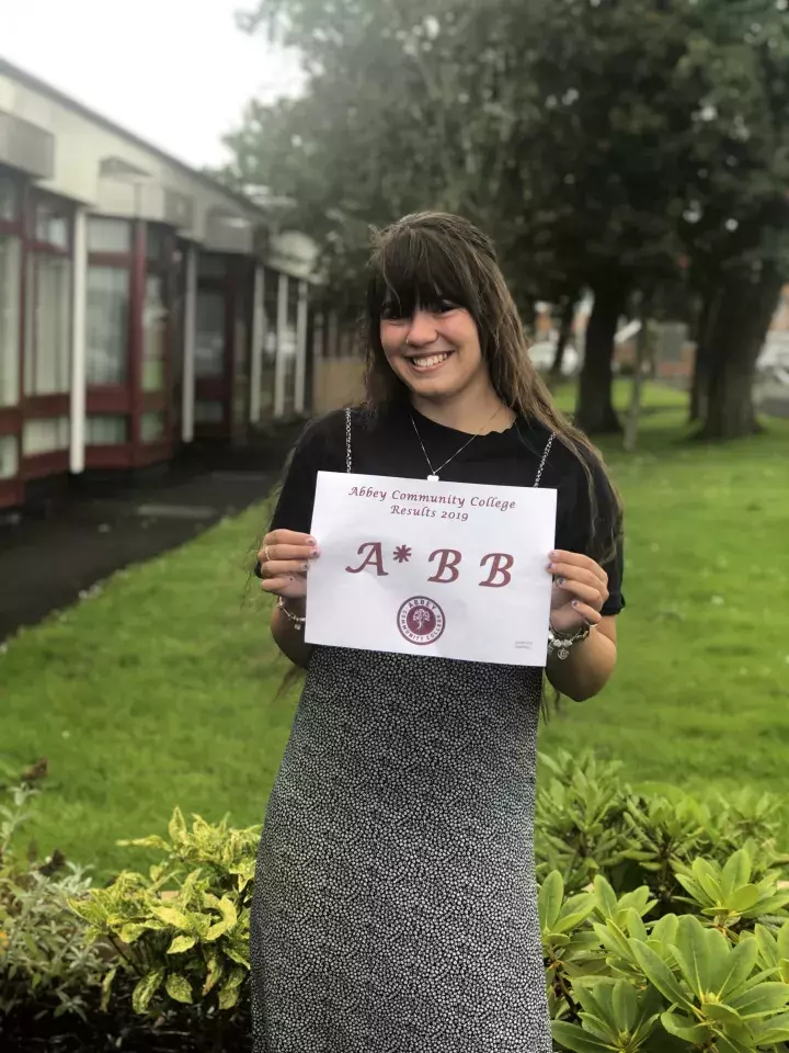 Student from Abbey Community College celebrating A level results