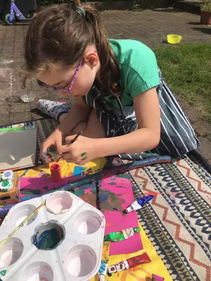 Dundela Infants' School and Nursery Unit painting outside