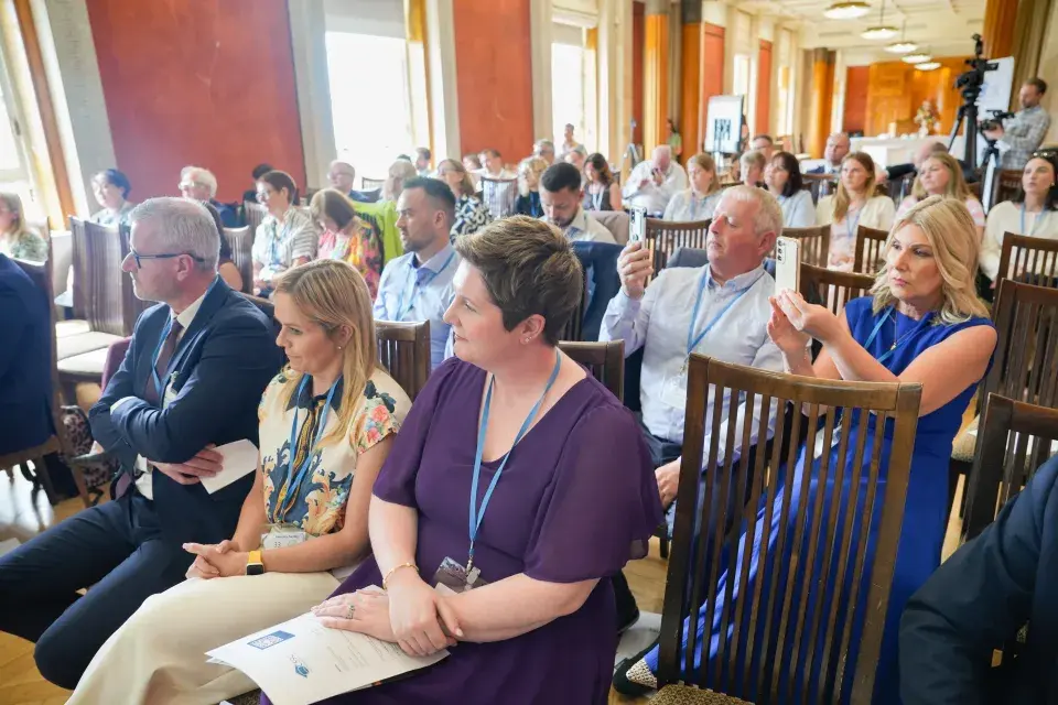 Audience photo of guests seated