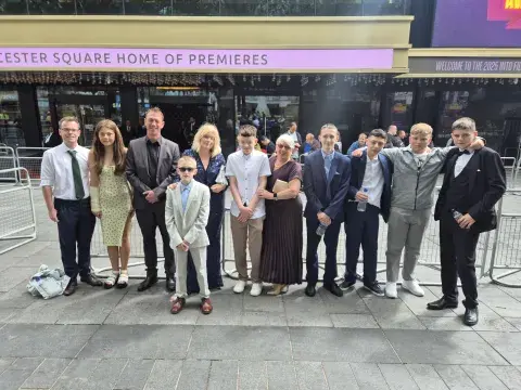 Park School outside Leicester Square Odeon, London 