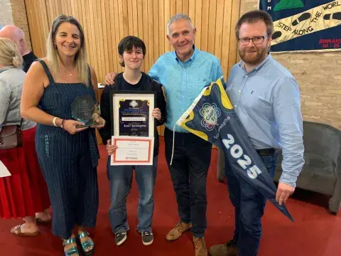 Representatives Glenlola Collegiate holding Award