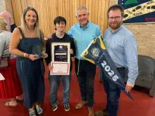 Representatives Glenlola Collegiate holding Award