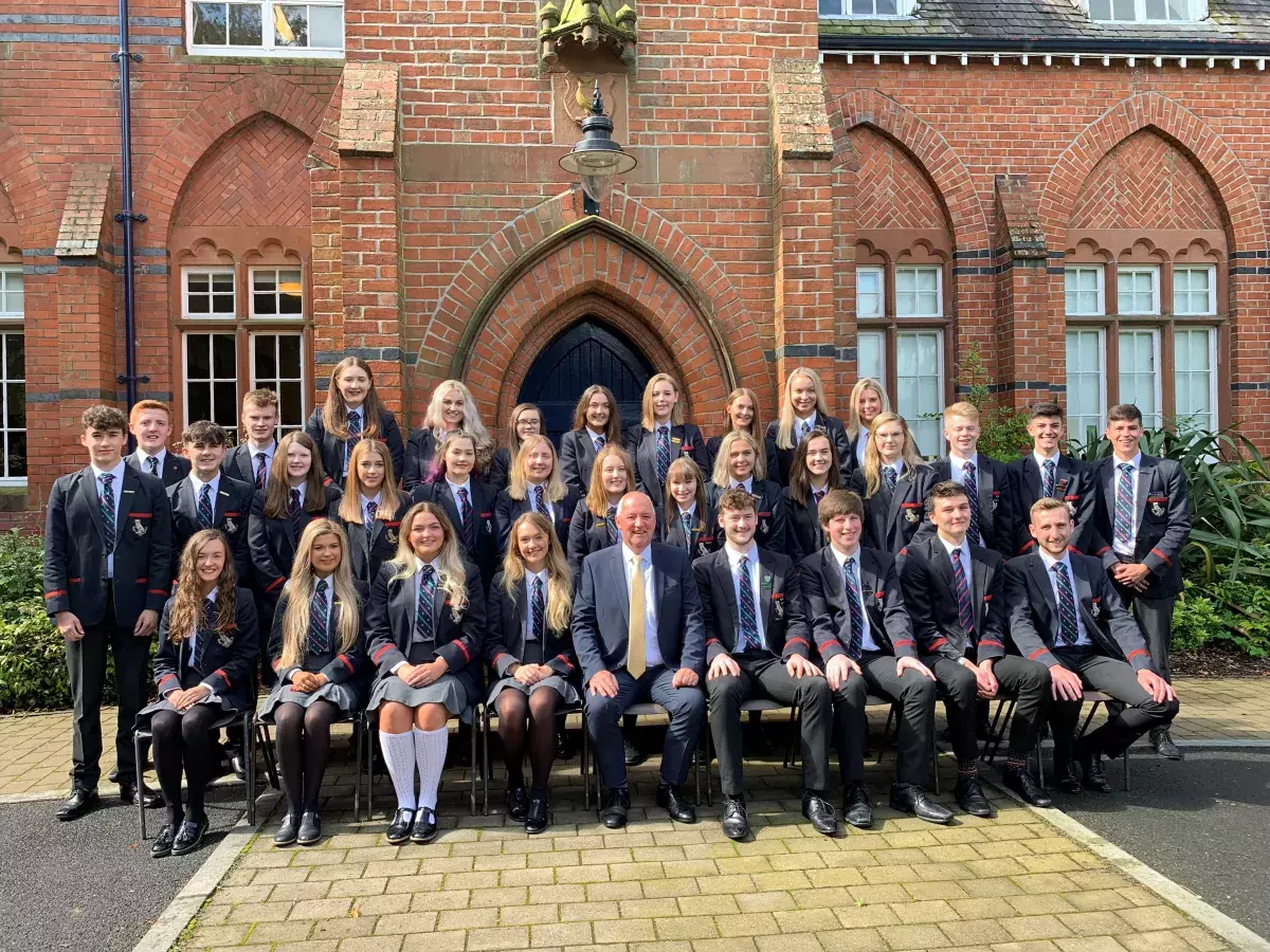 Pupils from Lurgan College celebrate A level results with Principal, Mr Trevor Robinson