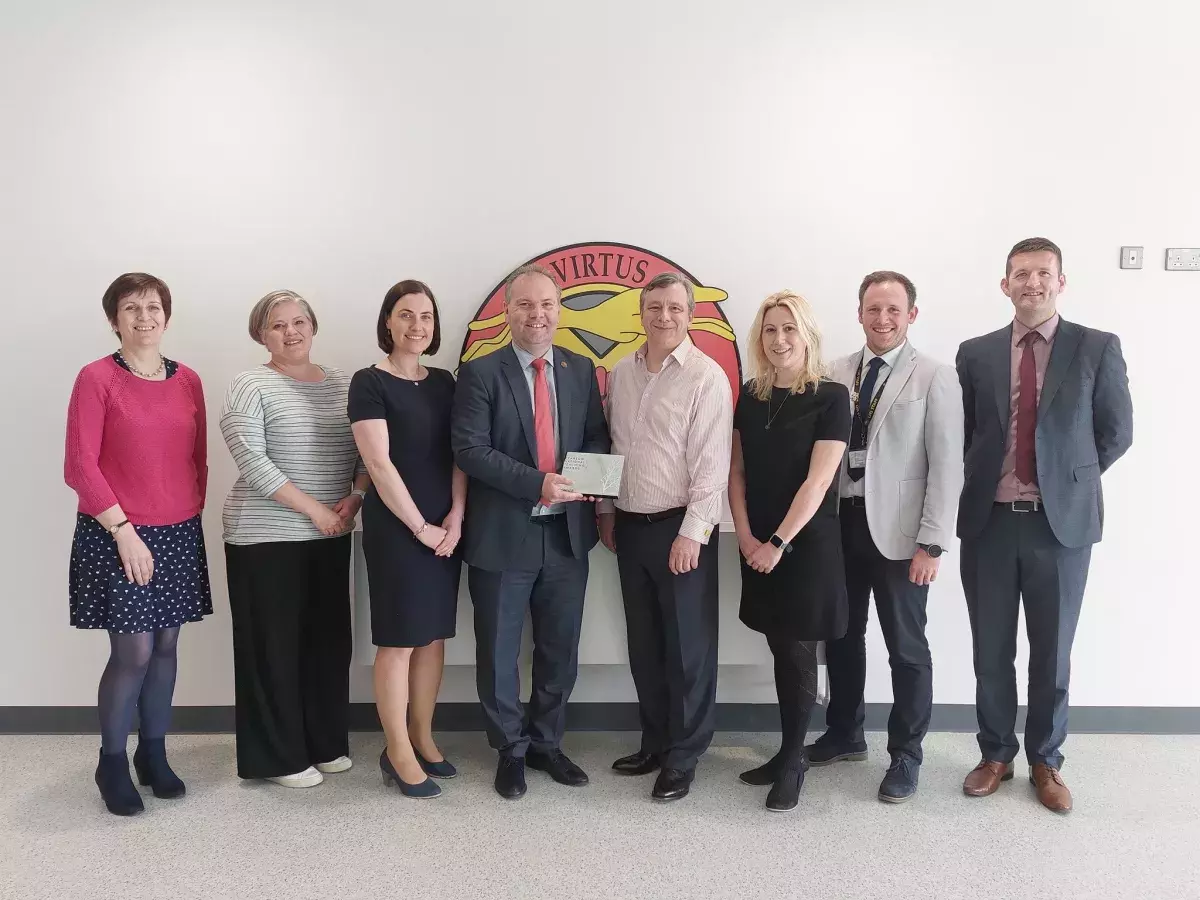 Limavady High School Team with Mark Baker and award 