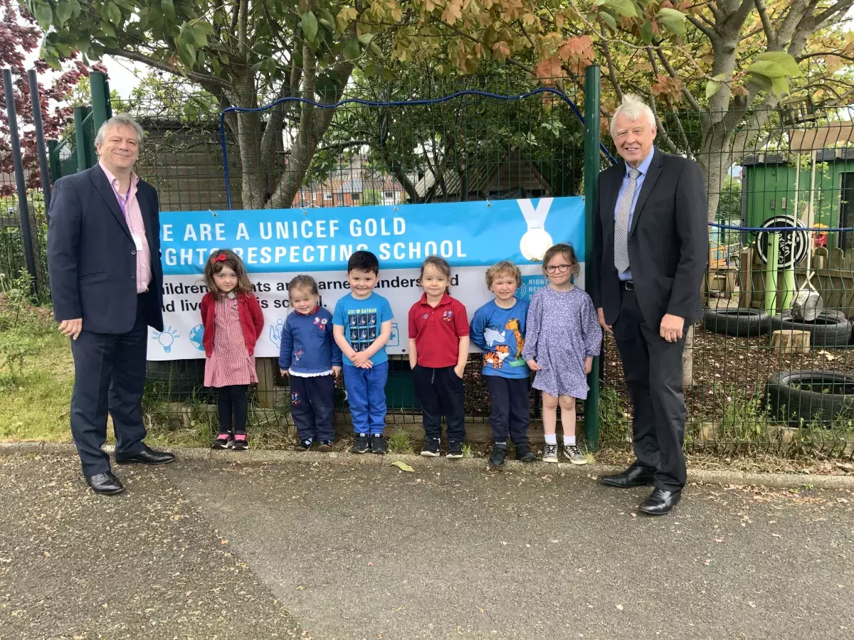 Mark Baker, CSSC and Barry Mulholland, Education Authority with pupils from Knockbreda Nursery School