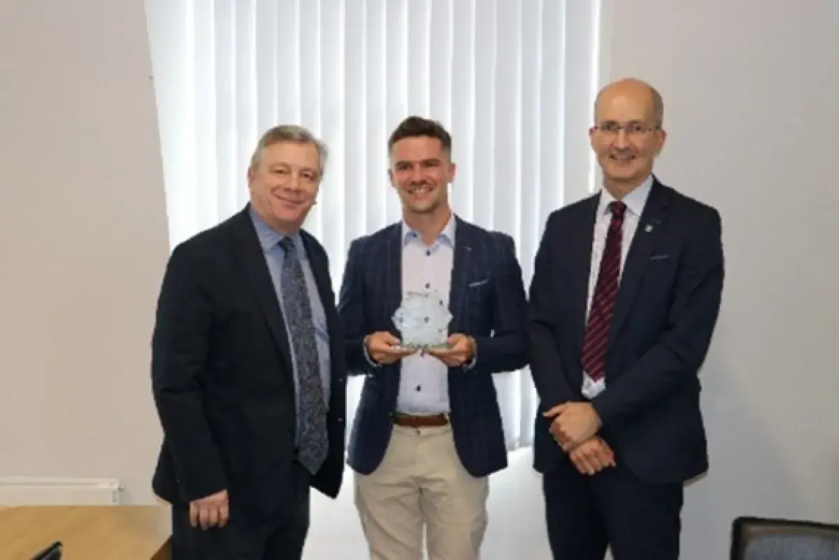 Mark Baker, Chief Executive, CSSC, Adam Willis, winner of CSSC Excellence in Educational Research Award and Noel Purdy, Stranmillis College